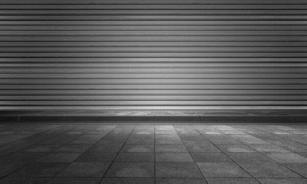 Empty space of parking bricks cement floor with grey color rolling shutter door background in 3D ill